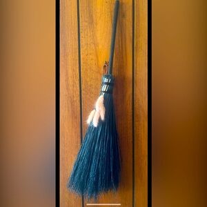Black broom stick